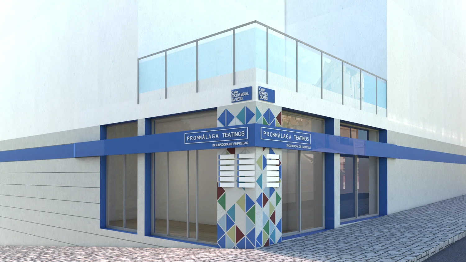 Vorschau der Ecke der Büros PROMÁLAGA Teatinos in Málaga mit doppeltem Schild Incubadora de Empresas und Dreieckskomposition von Klic Arquitectos
